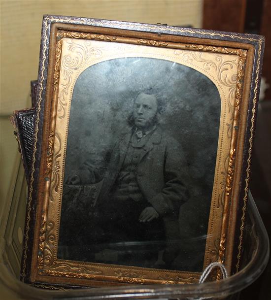 A group of seven leather cased photographs and daguerreotypes, largest 5in.
